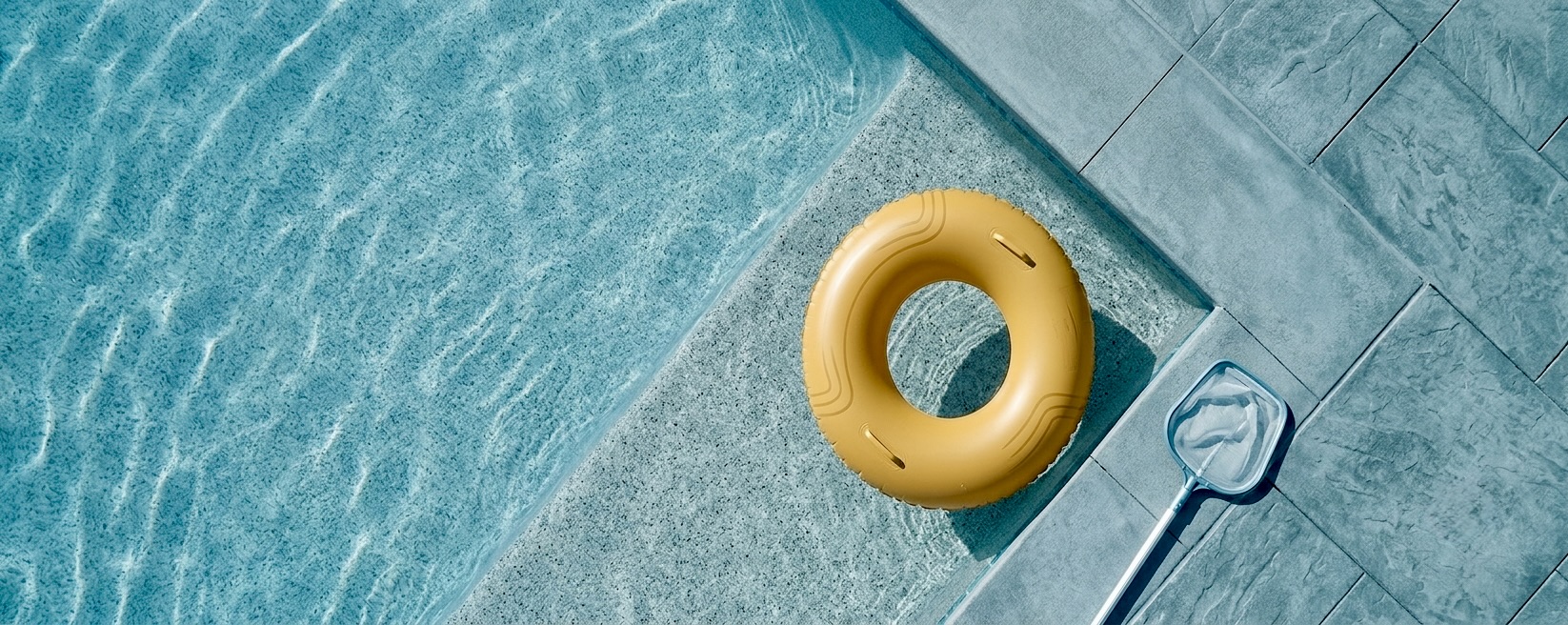 Backyard pool serviced by Imm's Pool and Spa